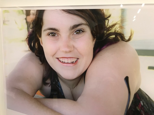 Photo of a photo of a young woman